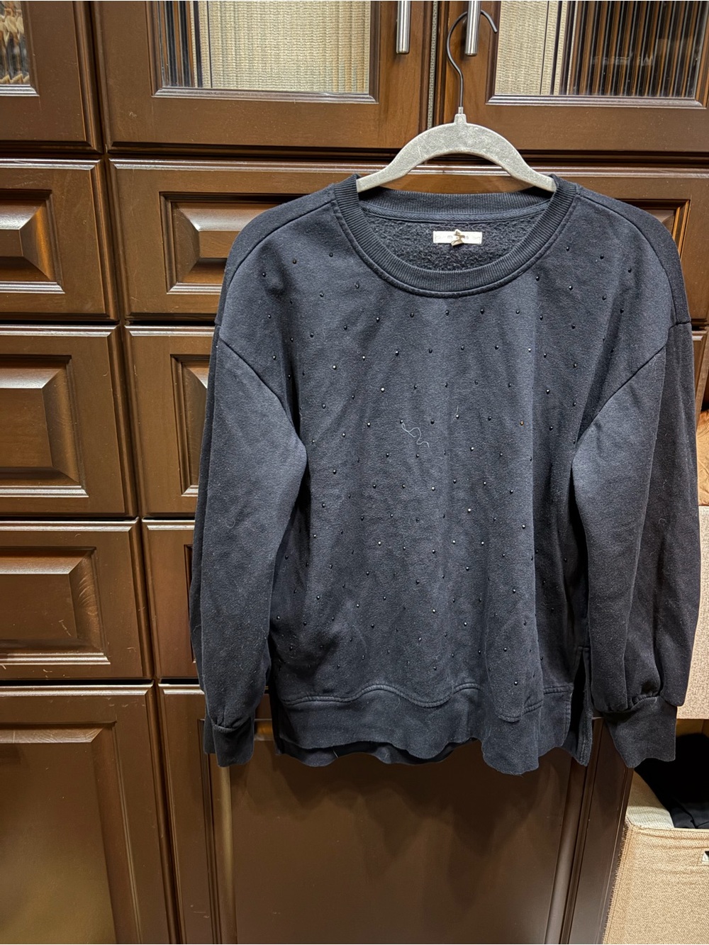 Women's Black Crewneck Sweatshirt with Subtle Stud Accents